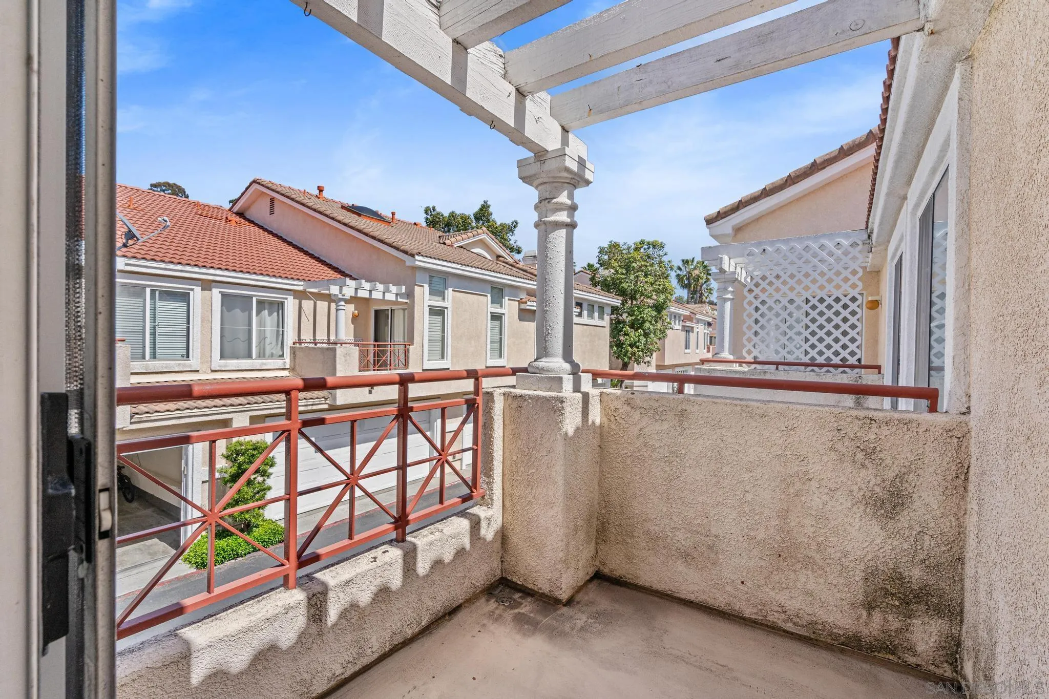 9338 Babauta Road, Unit 78 San Diego, CA 92129 - Photo 21 of 26 a view of a balcony with paintings on the wall