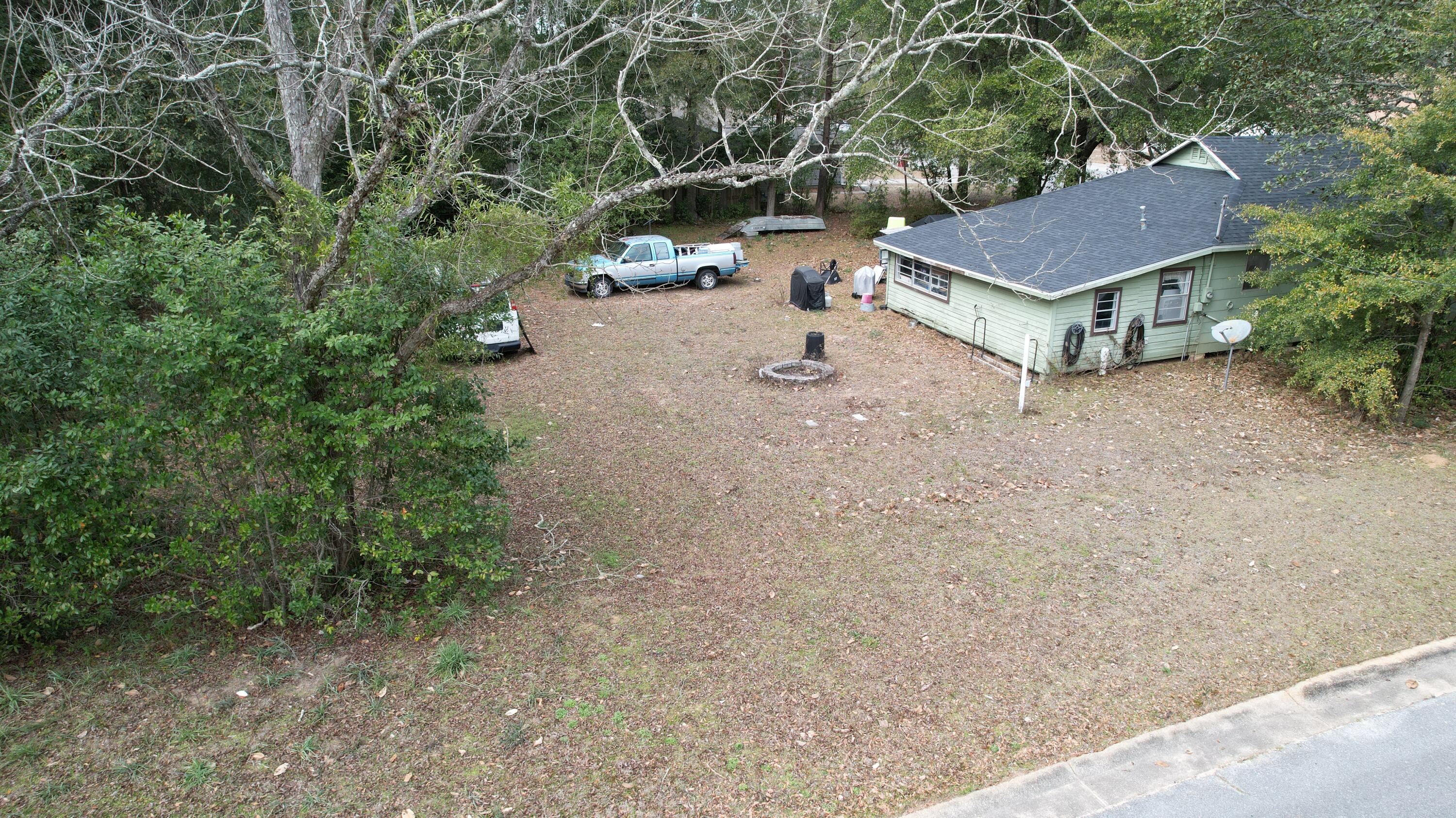 625 East Chestnut Avenue Crestview, FL 32539 - Photo 14 of 19 a view of house and outdoor space