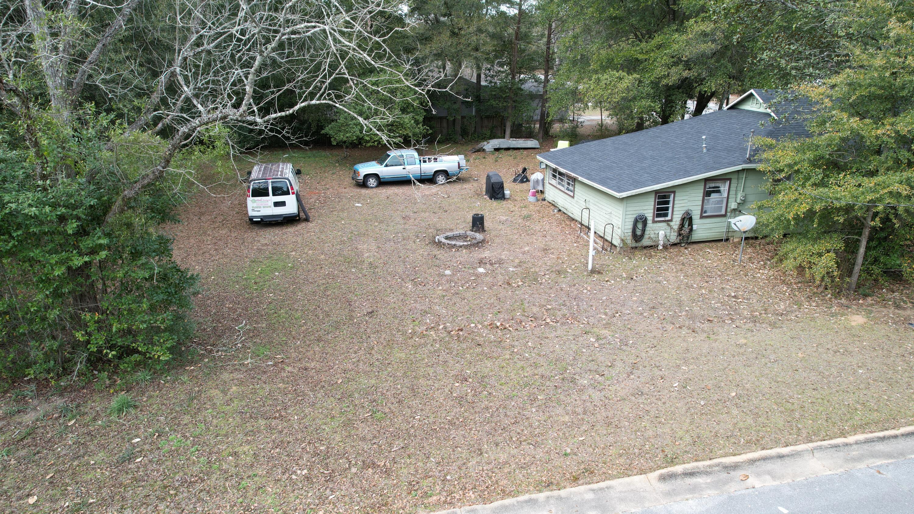 625 East Chestnut Avenue Crestview, FL 32539 - Photo 15 of 19 an aerial view of a house with garden space