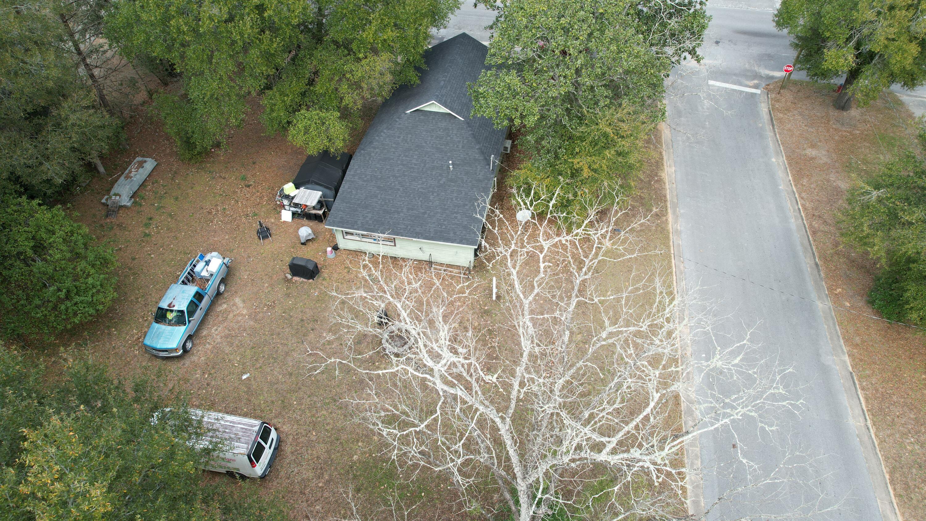 625 East Chestnut Avenue Crestview, FL 32539 - Photo 7 of 19 an aerial view of a house with outdoor space