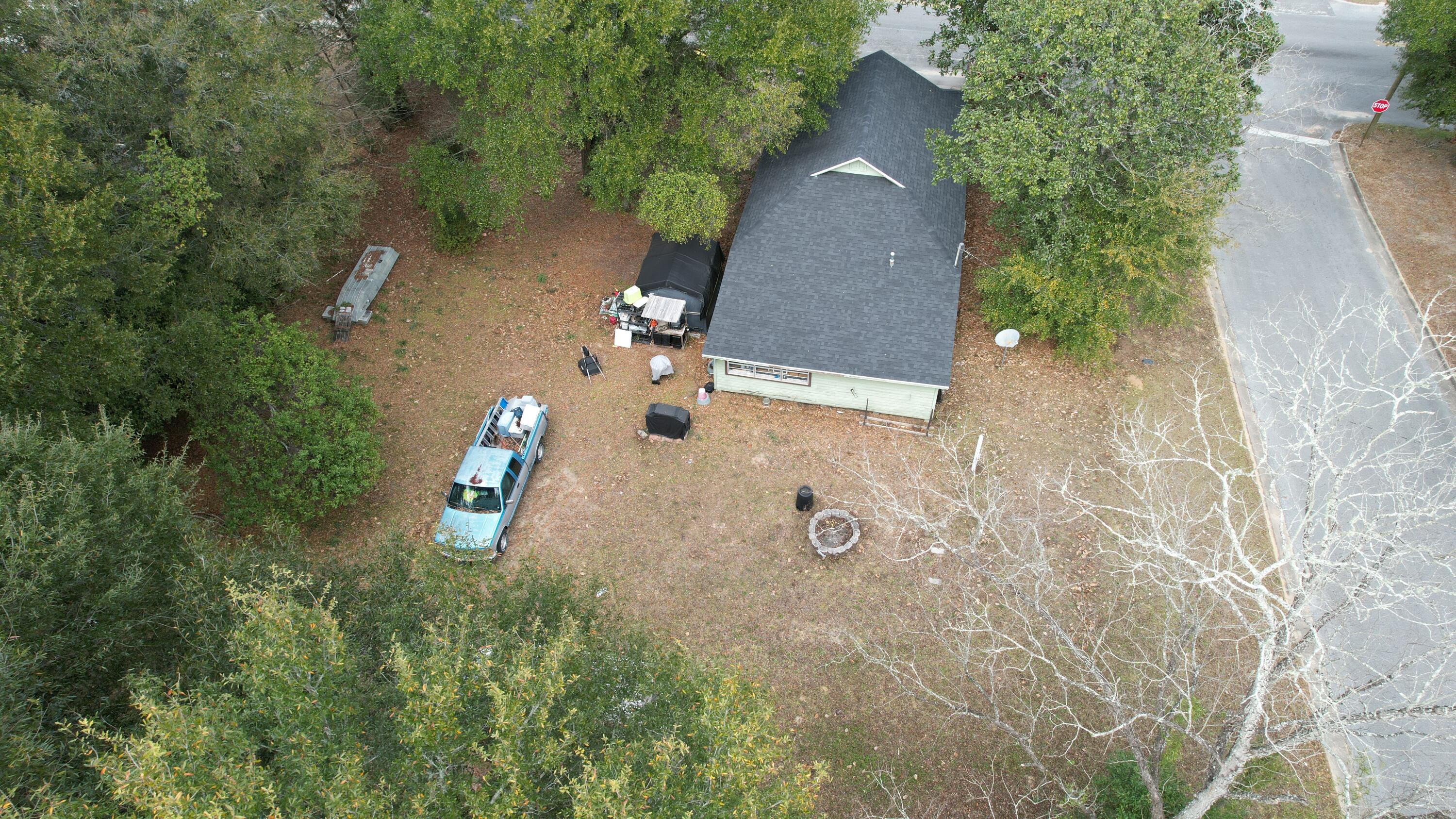 625 East Chestnut Avenue Crestview, FL 32539 - Photo 8 of 19 an aerial view of a house with outdoor space and street view