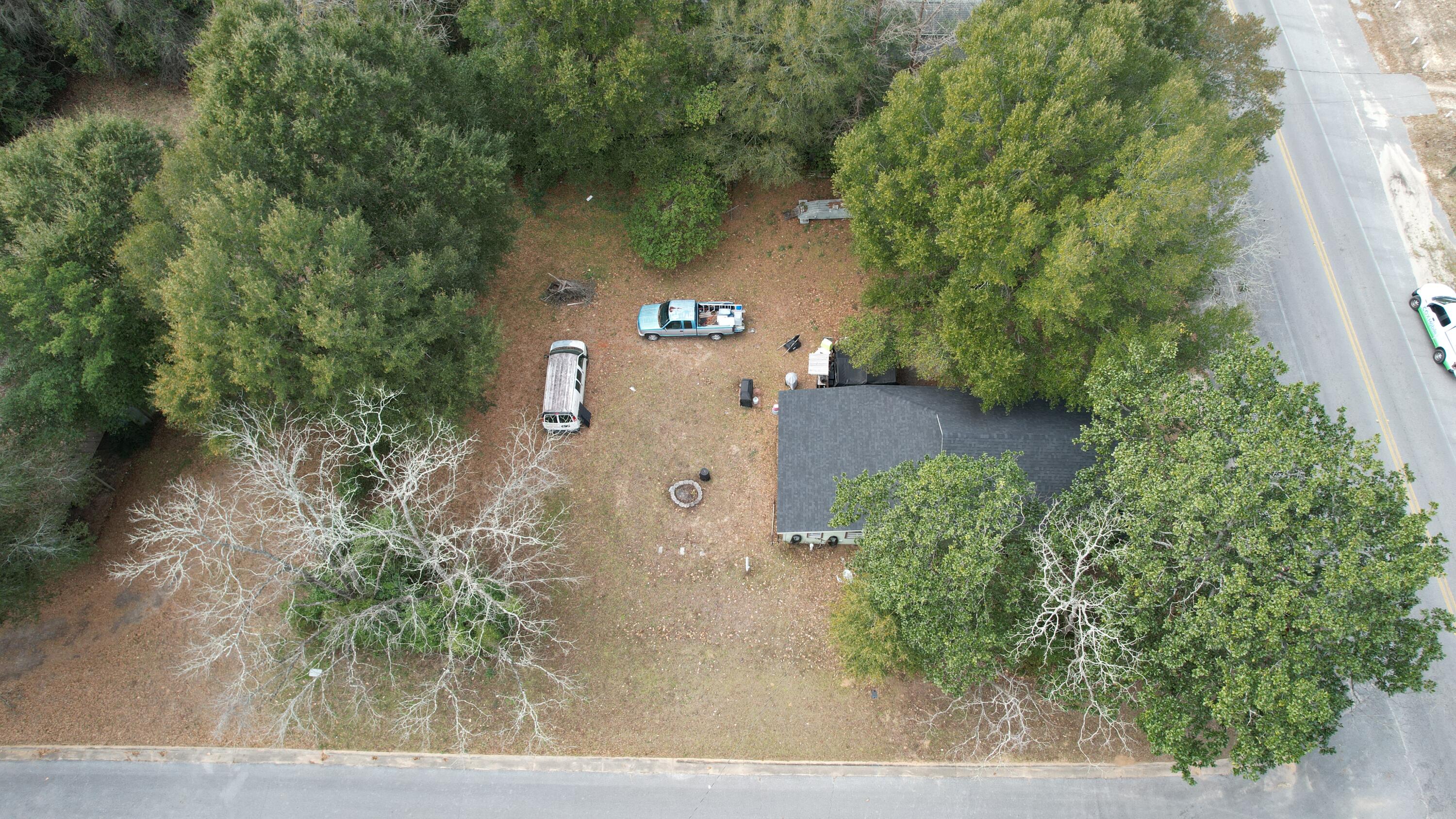 625 East Chestnut Avenue Crestview, FL 32539 - Photo 9 of 19 an aerial view of a house with a yard