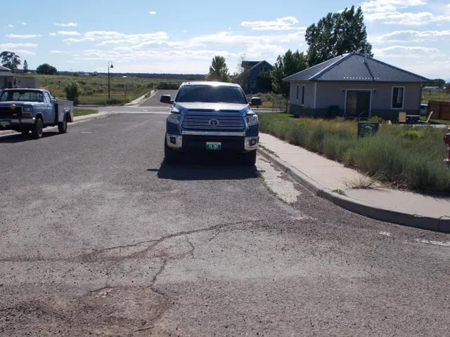 a view of a car in front of house