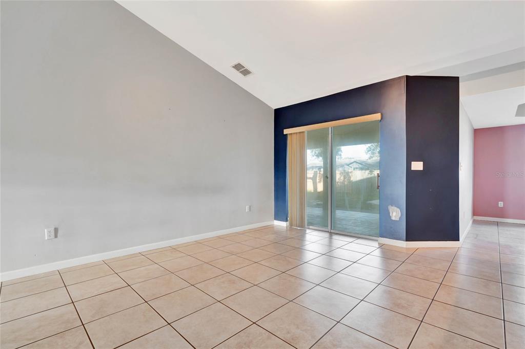 2443 Waterfall Drive Spring Hill, FL 34608 - Photo 10 of 35 a view of an empty room and window
