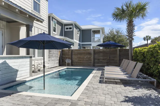 a view of a chairs and tables in the patio