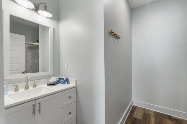 a bathroom with a sink and a mirror