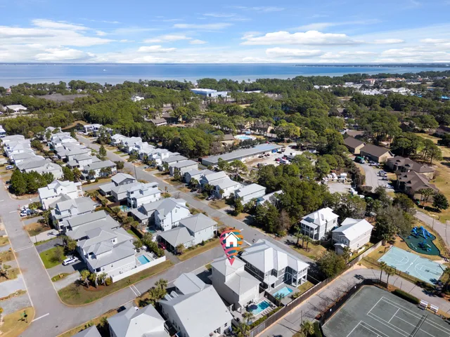 an aerial view of a city with lots of residential buildings