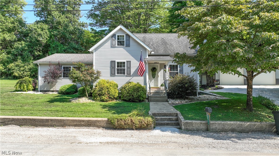 38610 Spiedel Town Road Bethesda, OH 43719 - Photo 1 of 33 View of front of home with a garage and a front yard