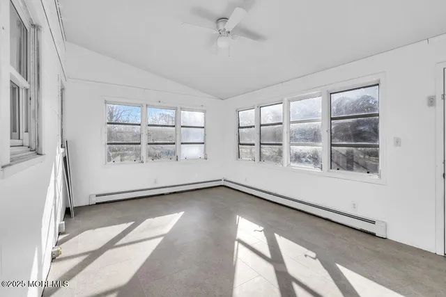 an empty room with windows