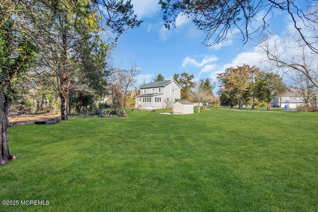 a view of a house with a big yard