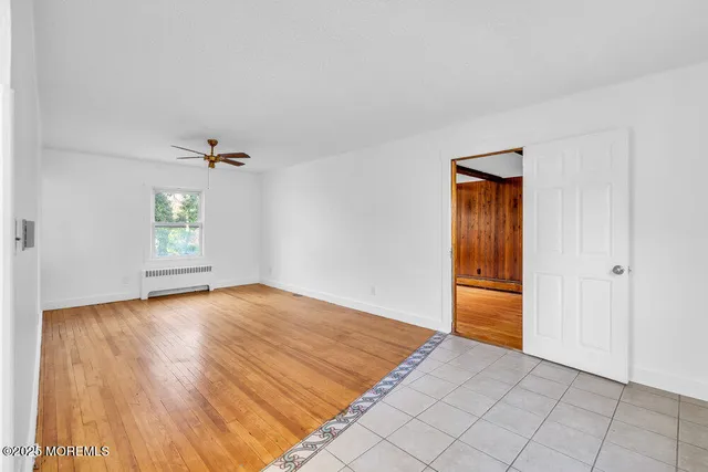 a view of an empty room and window