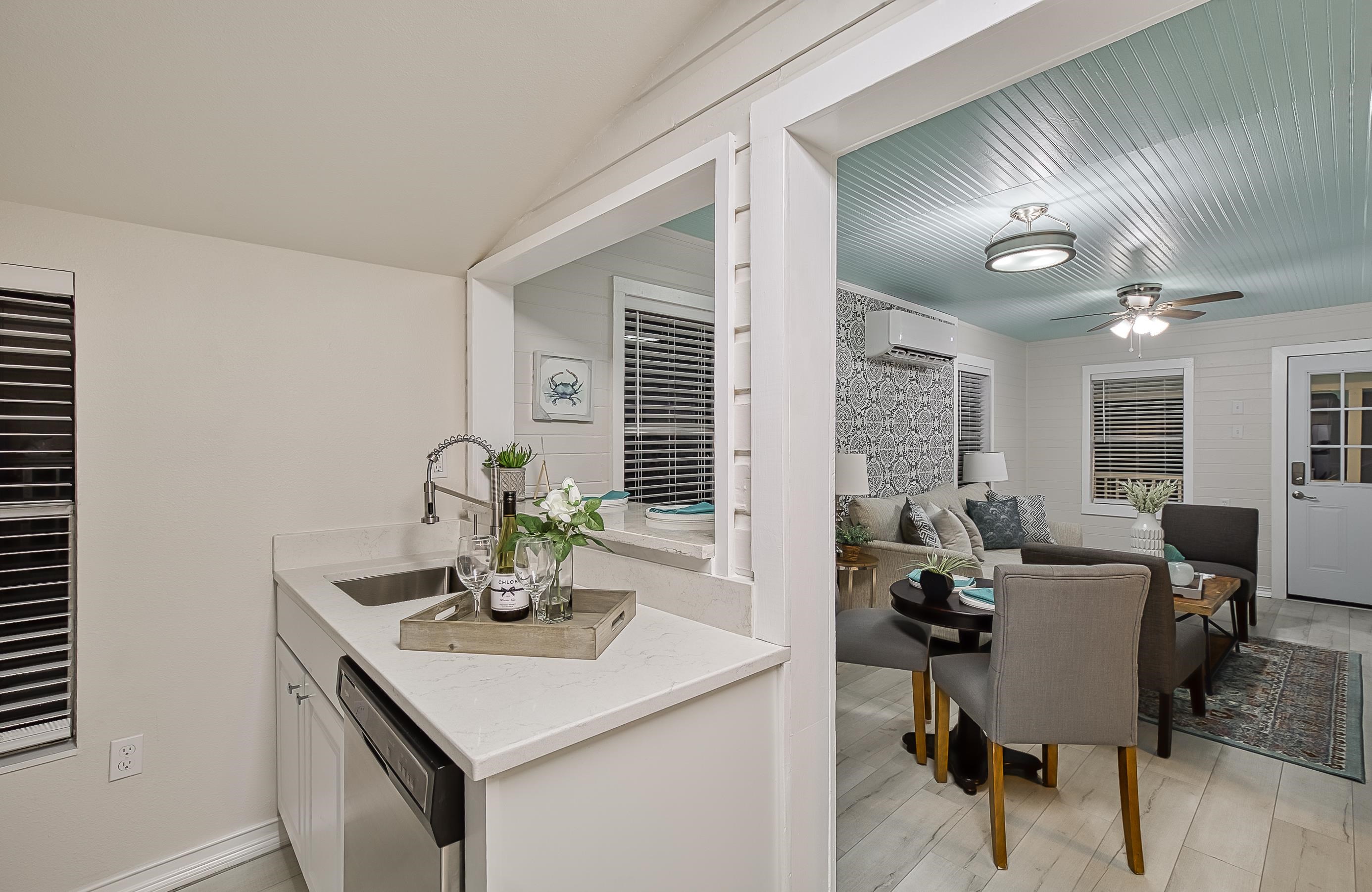 37 Phillips Street St. Augustine, FL 32084 - Photo 17 of 26 a view of a dining room with furniture and wooden floor