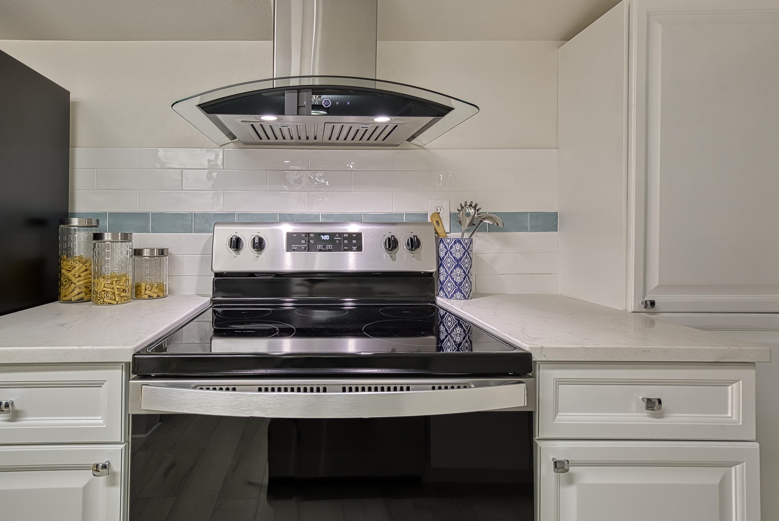 37 Phillips Street St. Augustine, FL 32084 - Photo 18 of 26 a stove top oven sitting inside of a kitchen