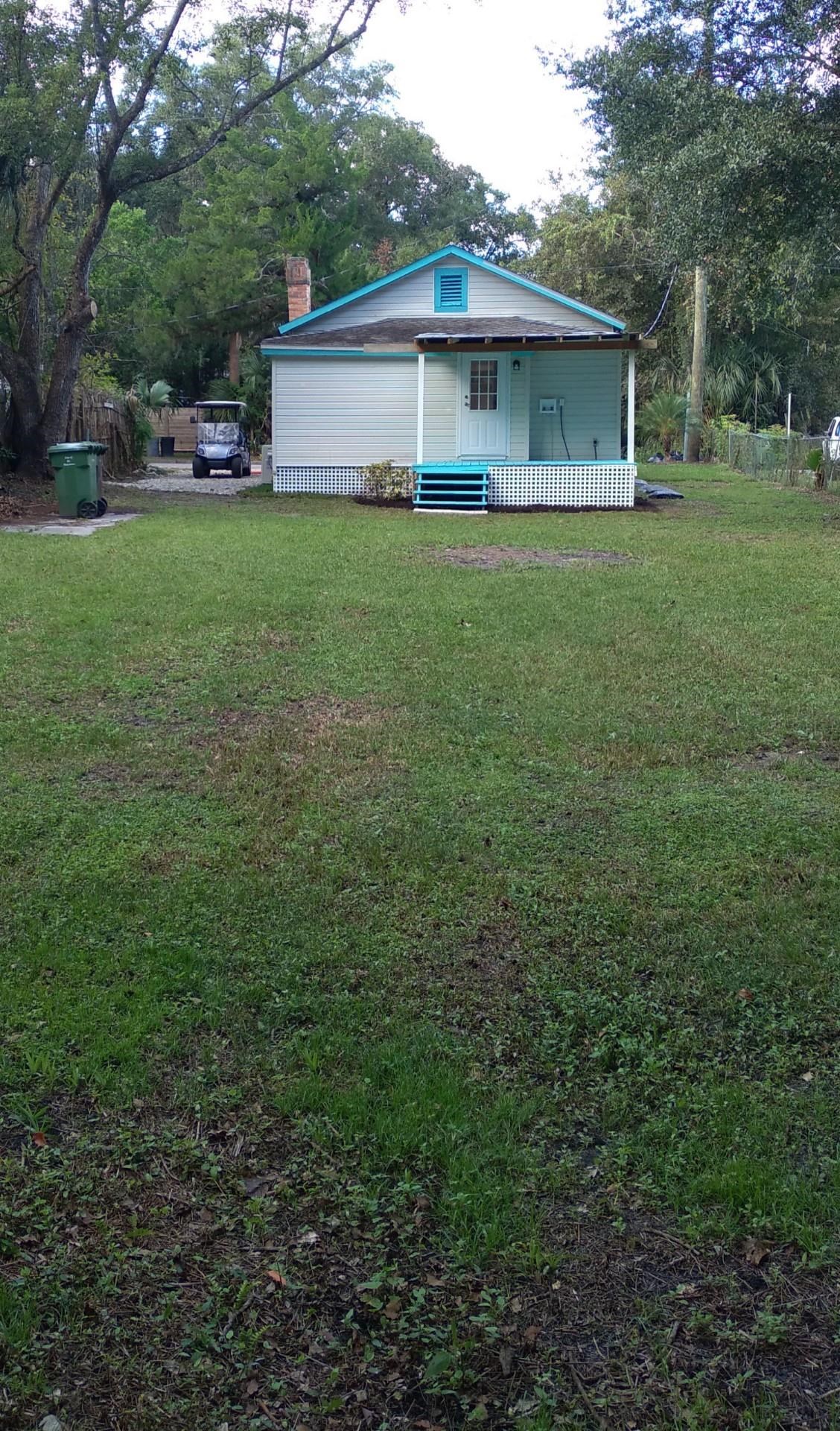 37 Phillips Street St. Augustine, FL 32084 - Photo 25 of 26 a view of a house with a yard