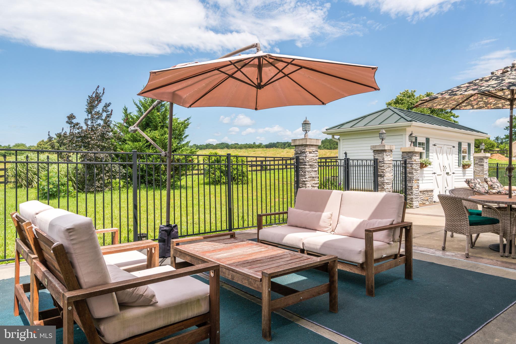 17440 True Blue Lane Reva, VA 22735 - Photo 13 of 75 a patio with a table and chairs