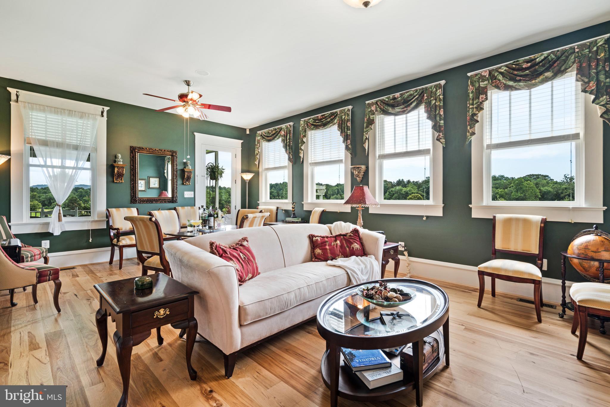 17440 True Blue Lane Reva, VA 22735 - Photo 21 of 75 a living room with furniture and a large window