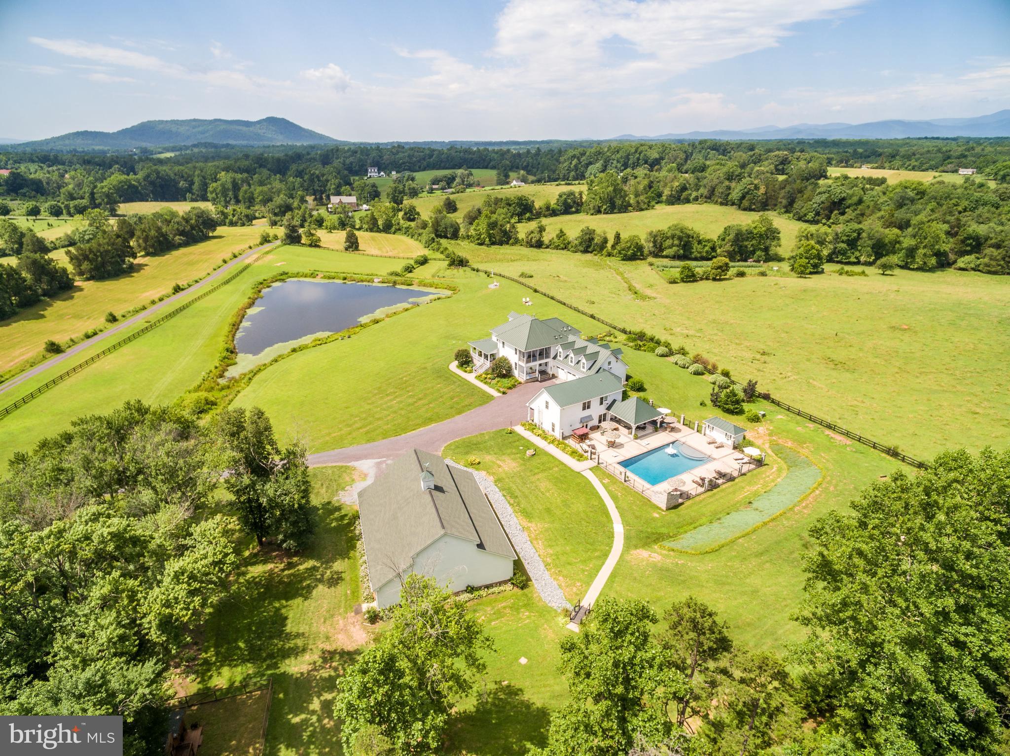 17440 True Blue Lane Reva, VA 22735 - Photo 4 of 75 a view of a swimming pool with a lake view