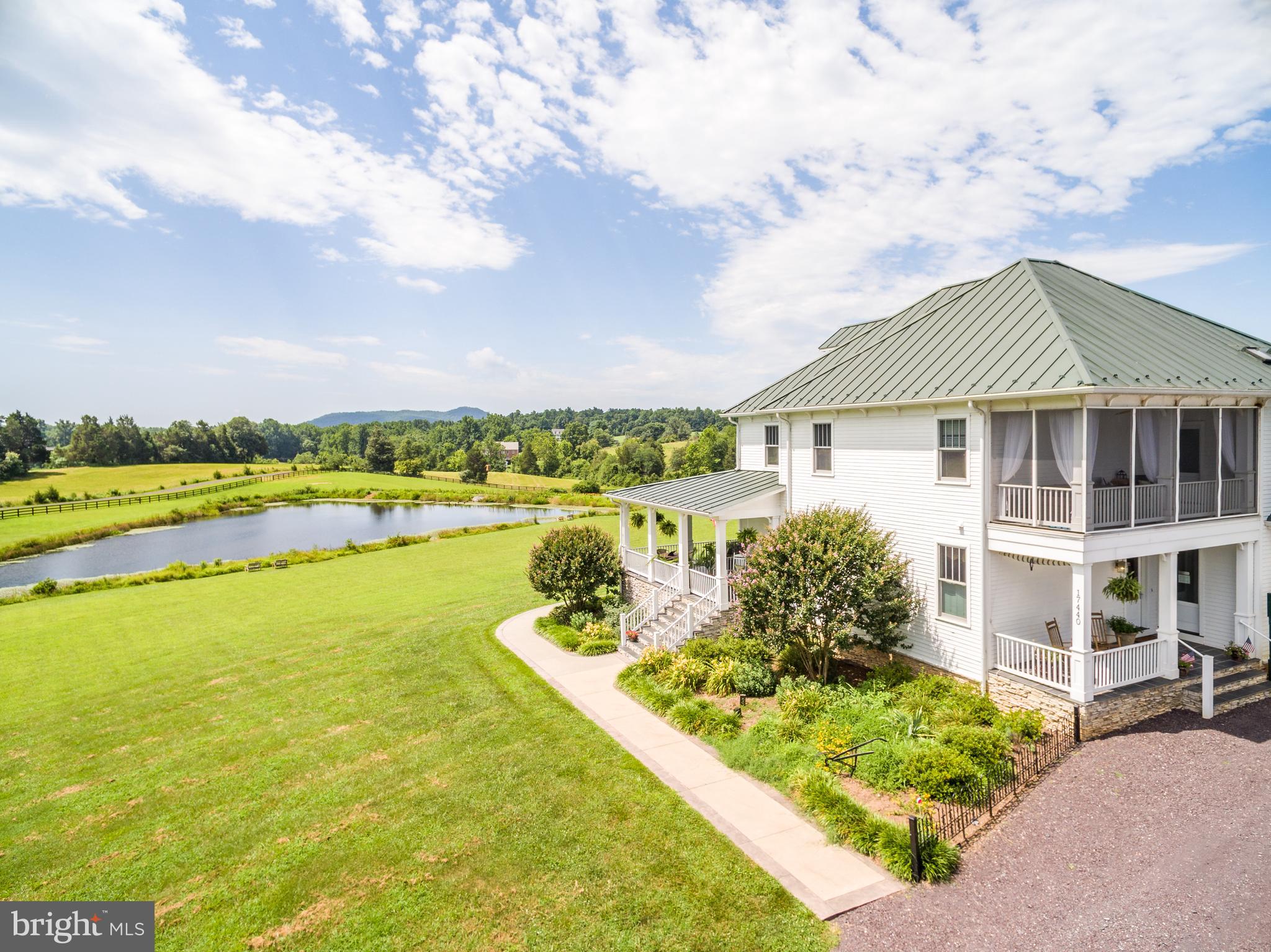 17440 True Blue Lane Reva, VA 22735 - Photo 5 of 75 a view of a house with a garden and lake view