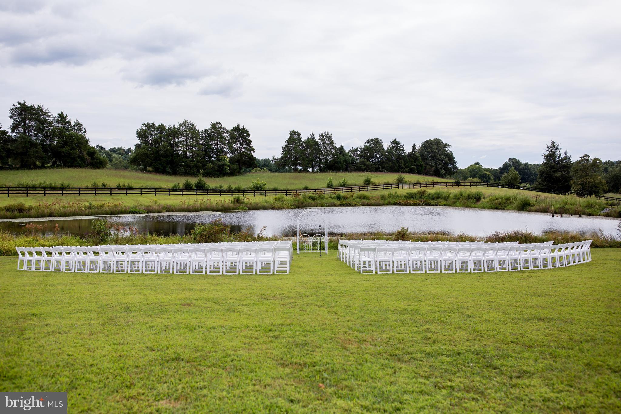 17440 True Blue Lane Reva, VA 22735 - Photo 65 of 75 a view of a lake with houses in the back
