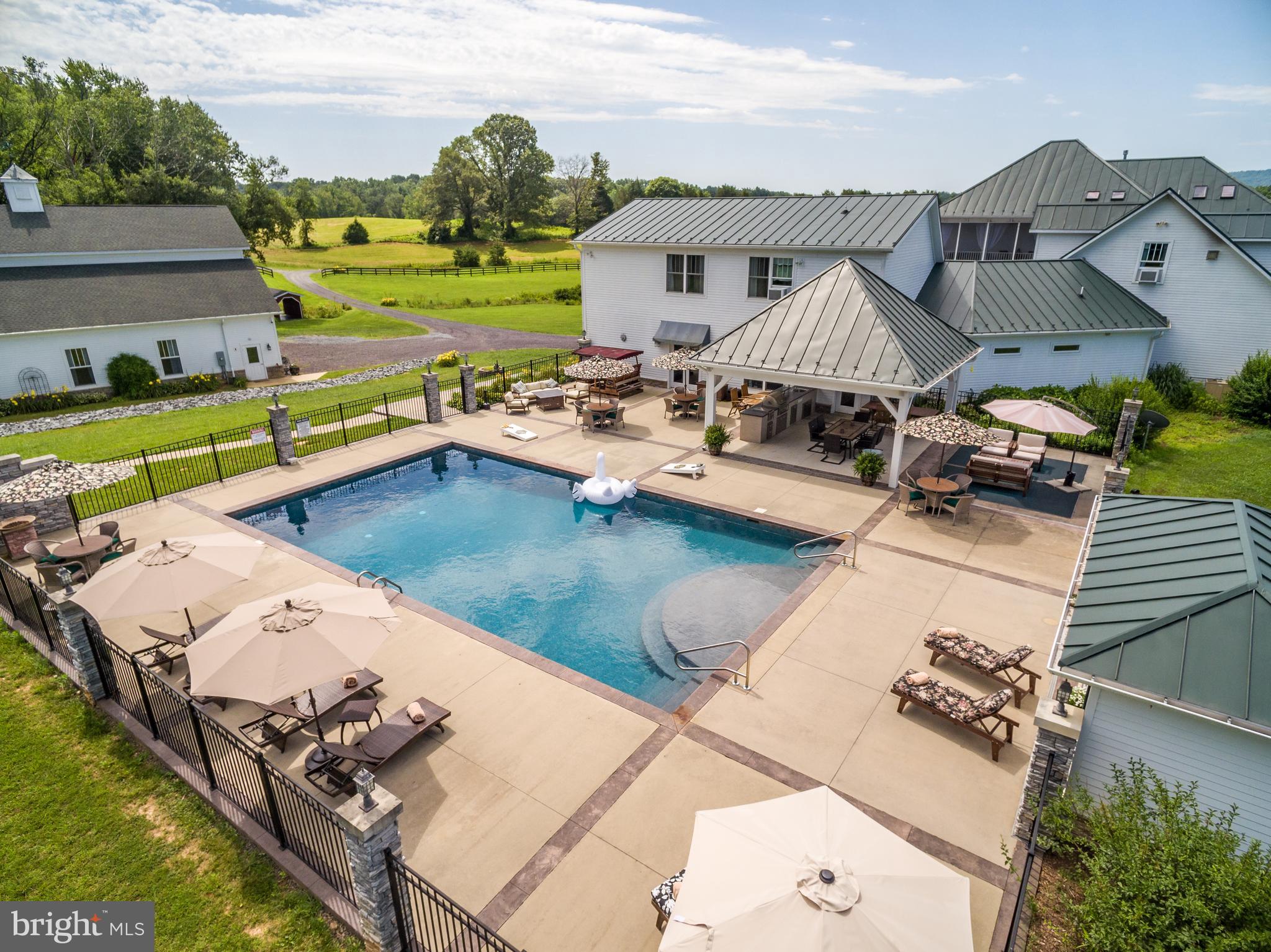17440 True Blue Lane Reva, VA 22735 - Photo 10 of 75 an aerial view of a house with yard swimming pool and outdoor seating