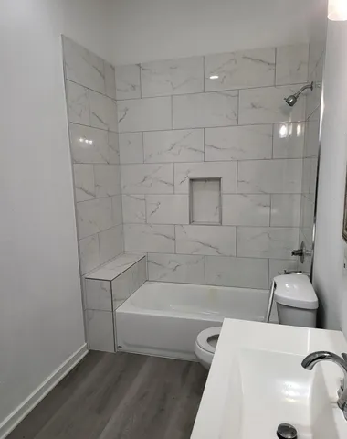 an empty room with a empty space and window