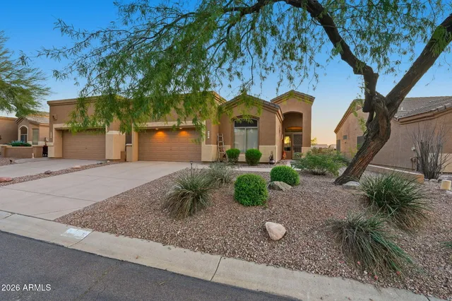 a view of hallway with windows