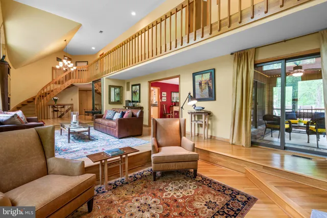 a living room with furniture and a rug