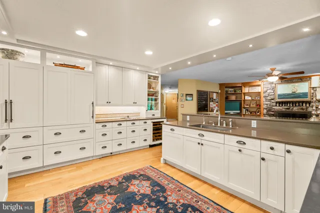 a bed room with a bed and a chair