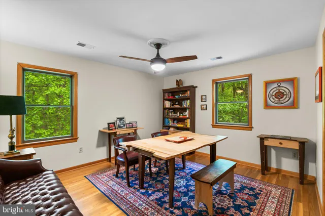 a room with furniture and a book shelf