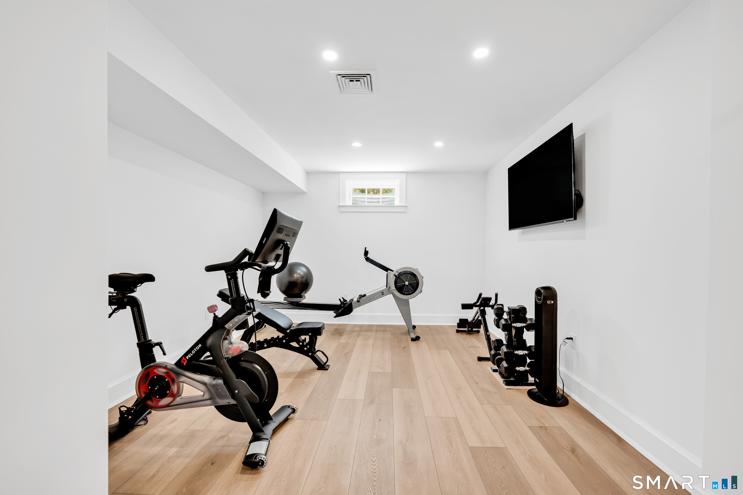 920 Old Post Road Fairfield, CT 06824 - Photo 29 of 40 A separate room in the lower level, ideal for a home gym. Can be a kids playroom, yoga studio or 2nd home office - so many options!