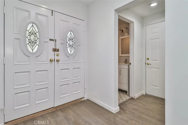 a view of a hallway with elevator