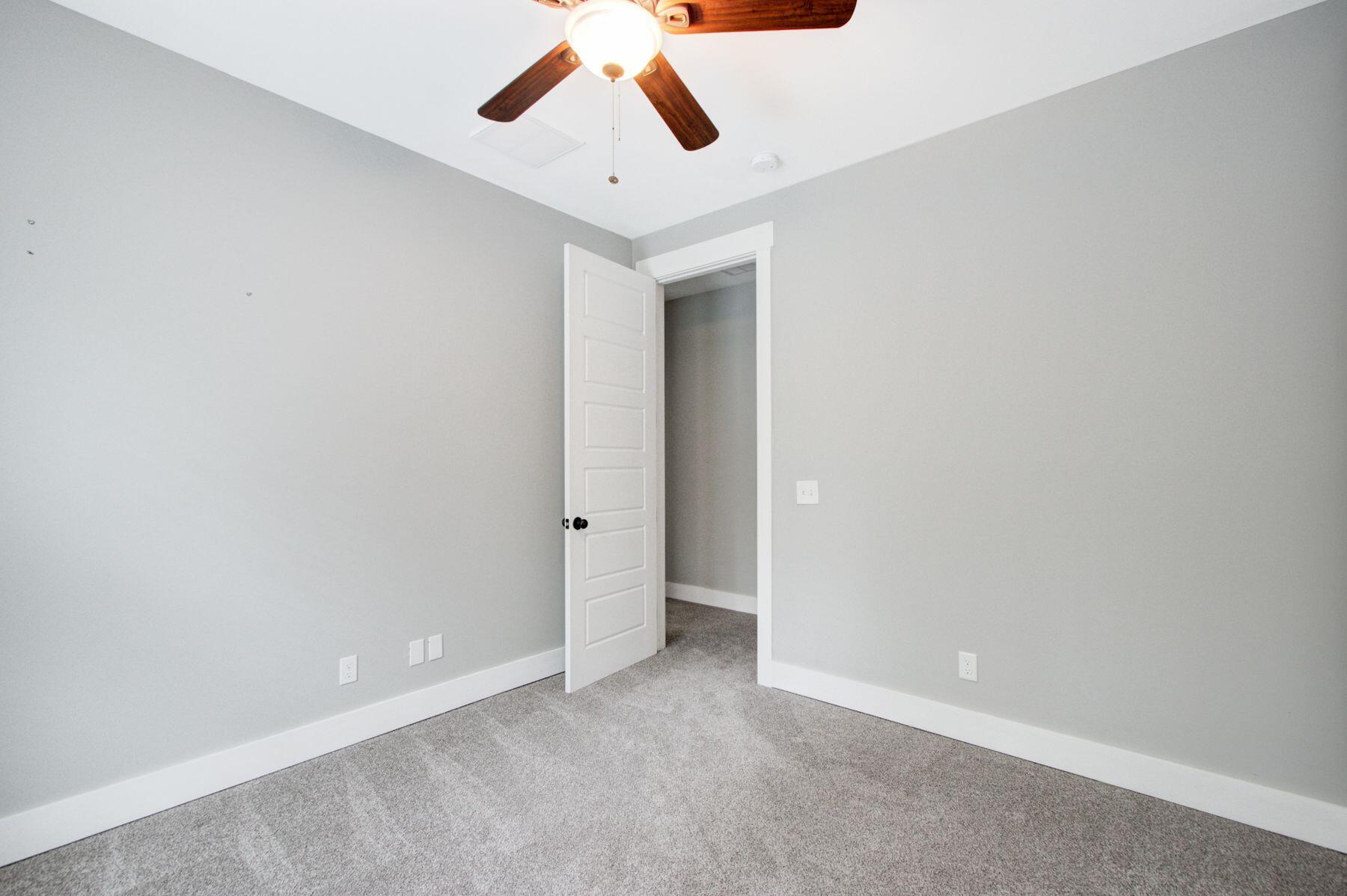 5943 Kelsey's Mill Road Ravenel, SC 29470 - Photo 29 of 50 Bedroom 2 door view