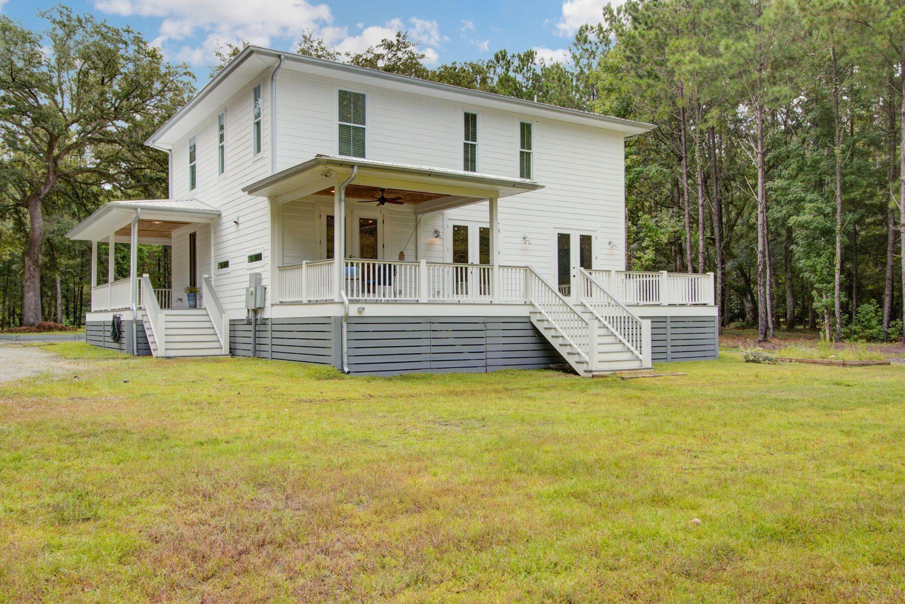 5943 Kelsey's Mill Road Ravenel, SC 29470 - Photo 41 of 50 Side view of house