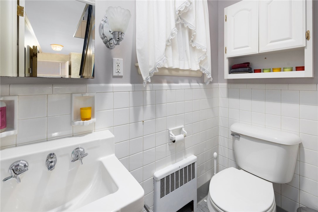 2 Lansdowne Road Warwick, RI 02888 - Photo 22 of 49 A first floor, half bath tucked away for convenience.