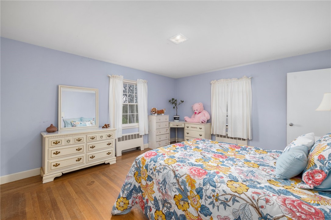2 Lansdowne Road Warwick, RI 02888 - Photo 28 of 49 The third bedroom is a great size and a second primary bedroom, offering a full bath.