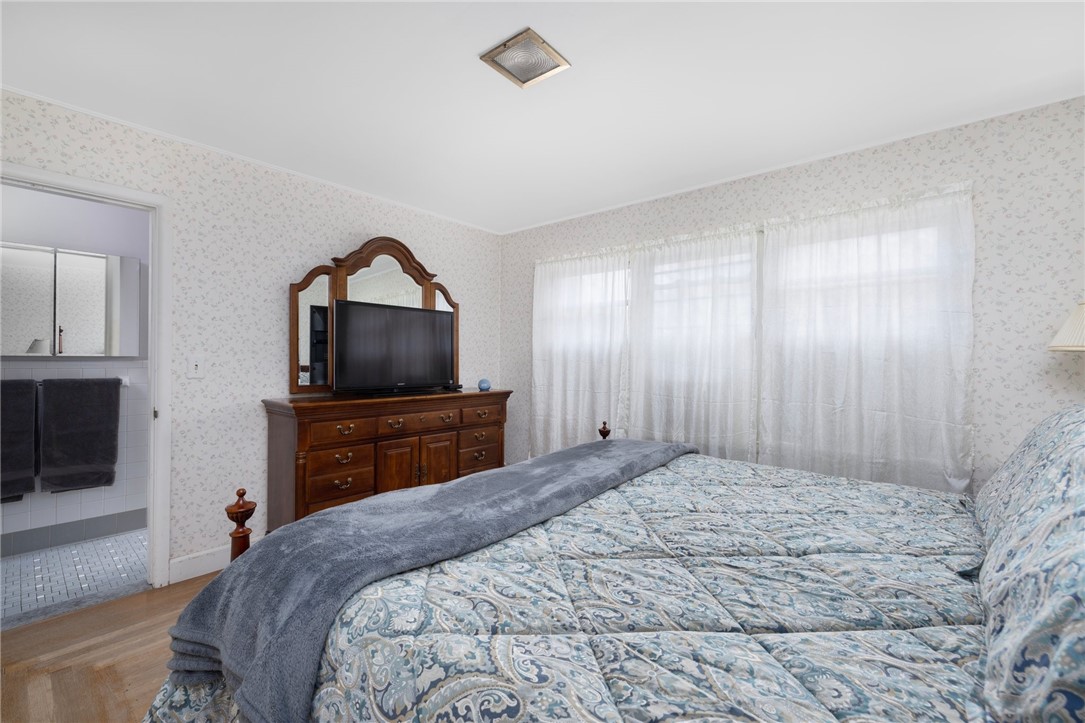 2 Lansdowne Road Warwick, RI 02888 - Photo 31 of 49 The primary bedroom offers hardwood floors and a large bathroom.