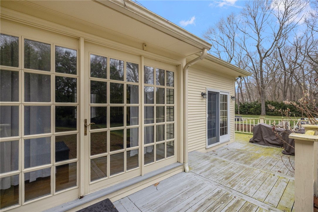 2 Lansdowne Road Warwick, RI 02888 - Photo 38 of 49 One of the many entertainment areas in the backyard is the deck that wraps from side to back.