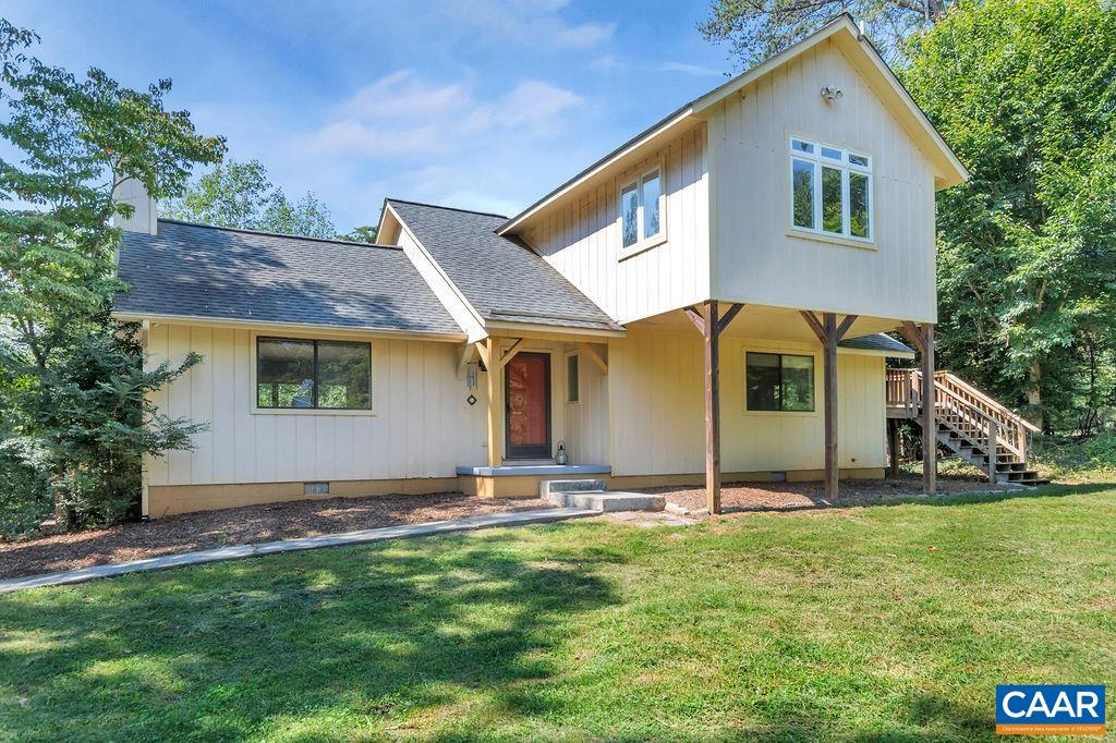 5668 Advance Mills Road Ruckersville, VA 22968 - Photo 1 of 56 a view of front of house with a yard