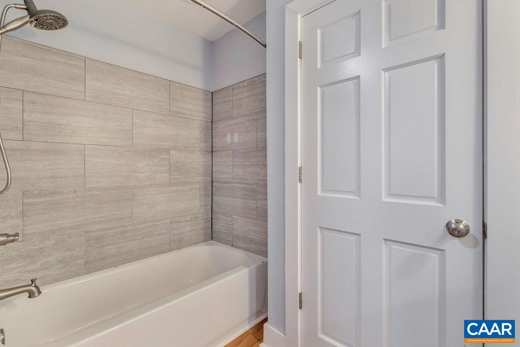 5668 Advance Mills Road Ruckersville, VA 22968 - Photo 36 of 56 a bathroom with a bathtub
