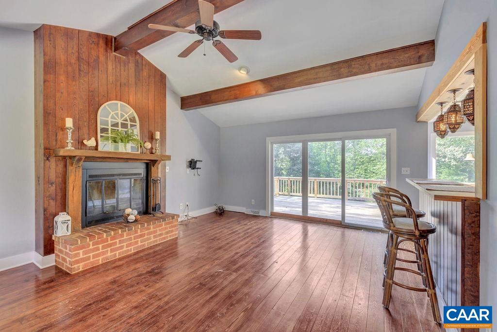 5668 Advance Mills Road Ruckersville, VA 22968 - Photo 5 of 56 a view of a livingroom with furniture and a fireplace