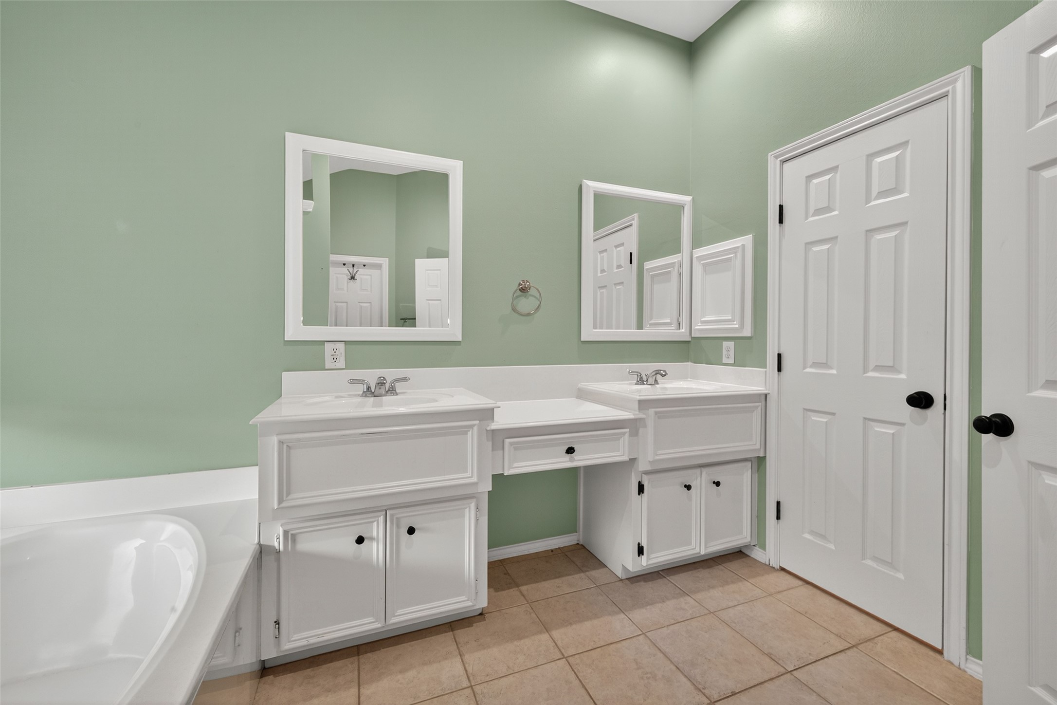 3131 Valley Court Manvel, TX 77578 - Photo 27 of 38 a spacious bathroom with a double vanity sink mirror and toilet