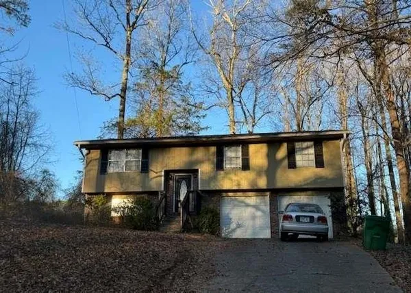 a car parked in front of a house