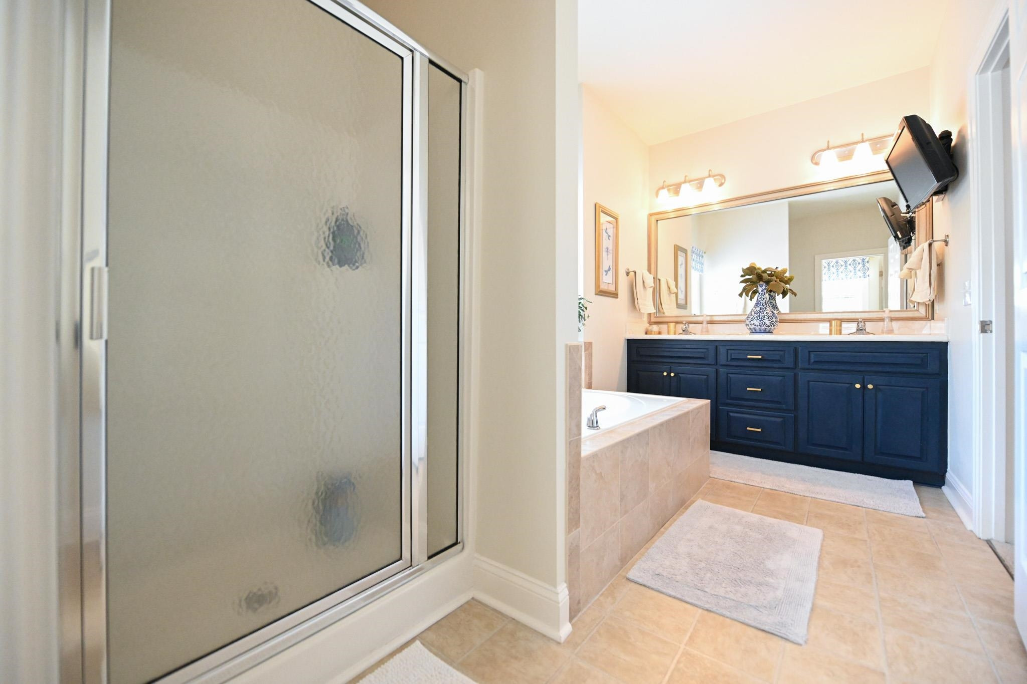 190 Pinecroft Drive Dunn, NC 28334 - Photo 12 of 51 a spacious bathroom with a tub shower and sink