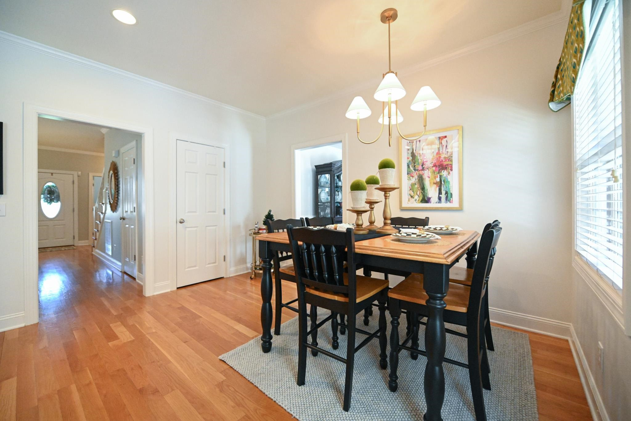 190 Pinecroft Drive Dunn, NC 28334 - Photo 29 of 51 a view of a dining room with furniture window and wooden floor