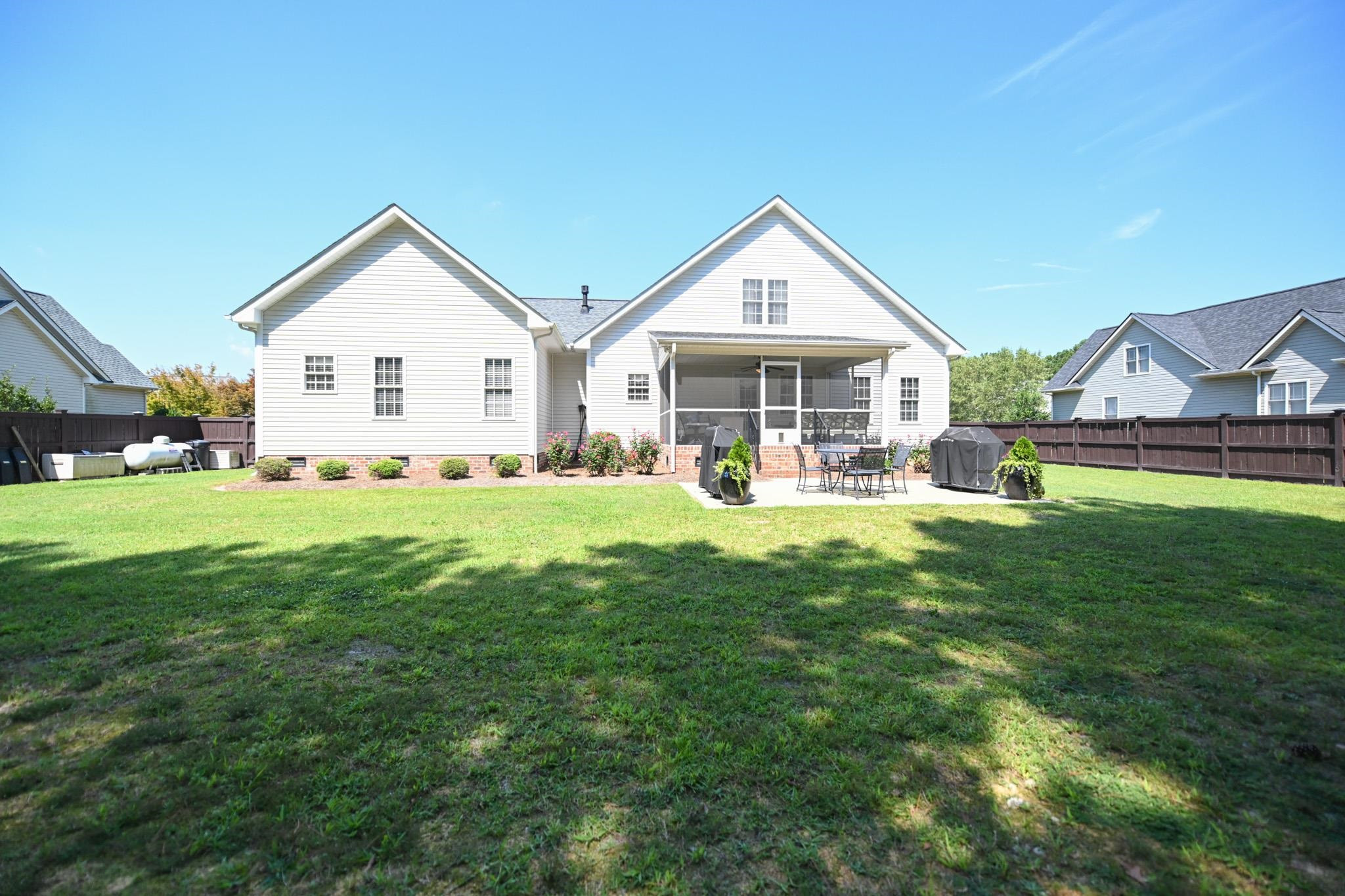 190 Pinecroft Drive Dunn, NC 28334 - Photo 6 of 51 a view of a house with a big yard and potted plants