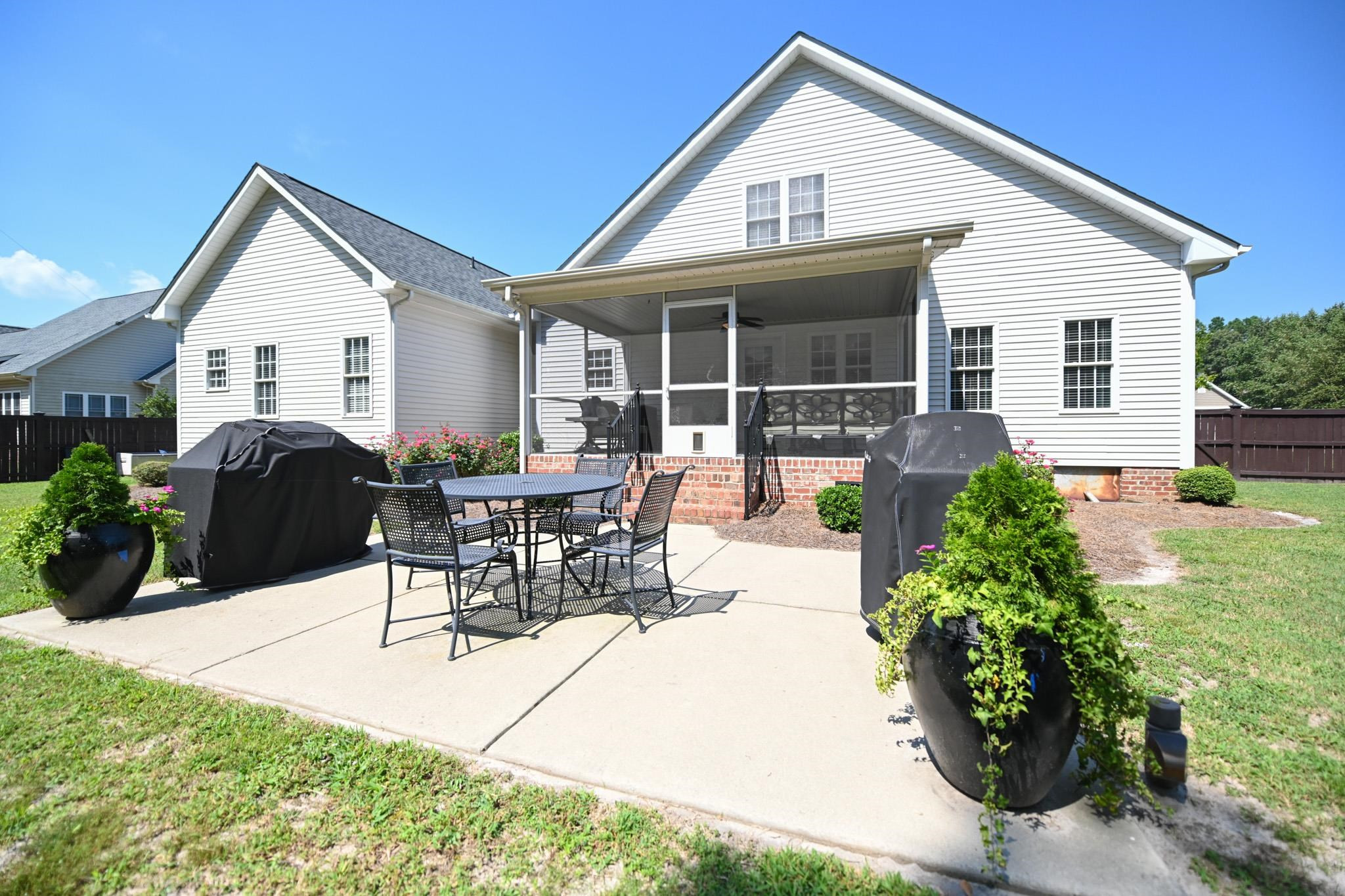 190 Pinecroft Drive Dunn, NC 28334 - Photo 8 of 51 a view of a house with yard and sitting area