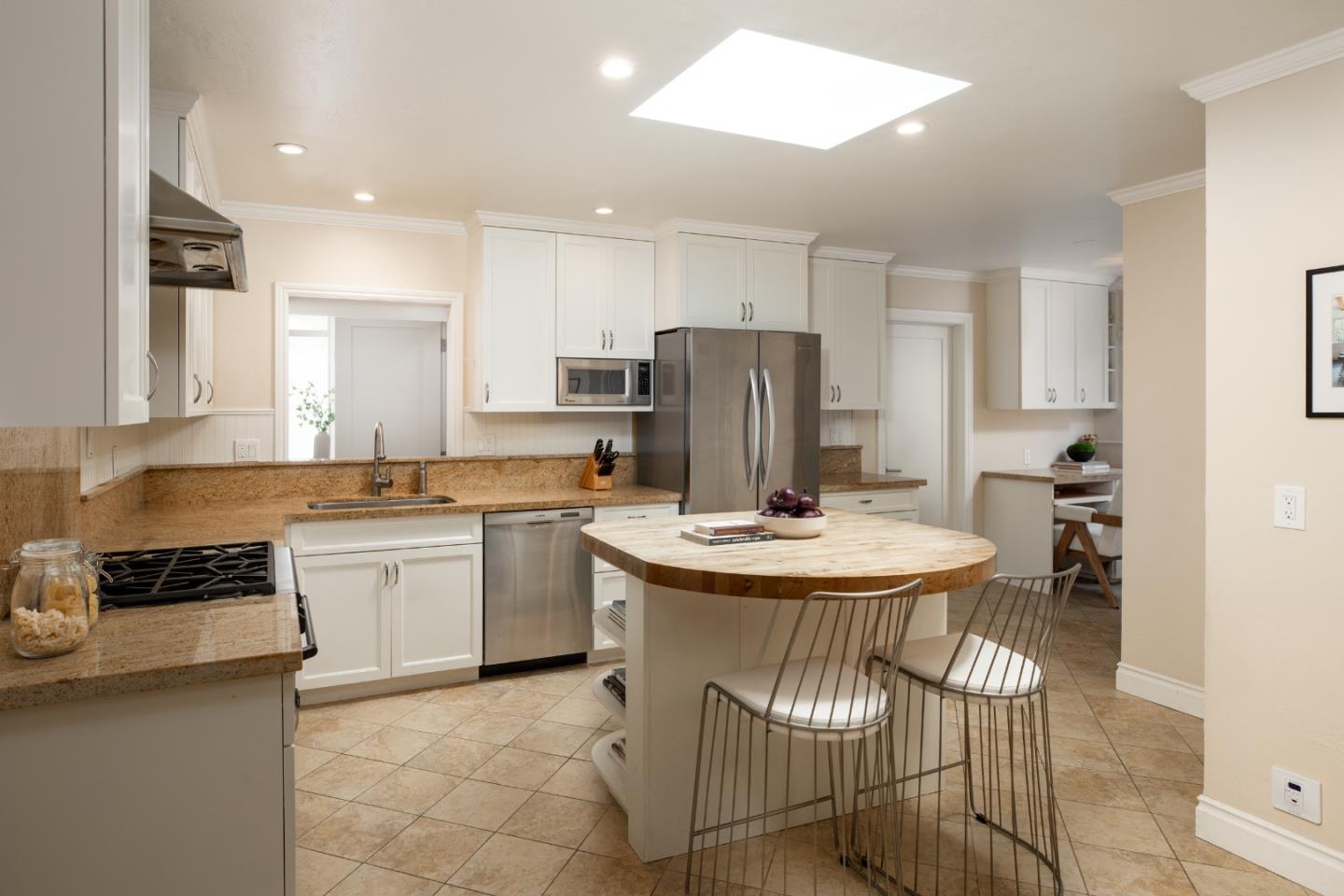 2018 Sharon Road Menlo Park, CA 94025 - Photo 4 of 6 a kitchen with a refrigerator and a stove top oven