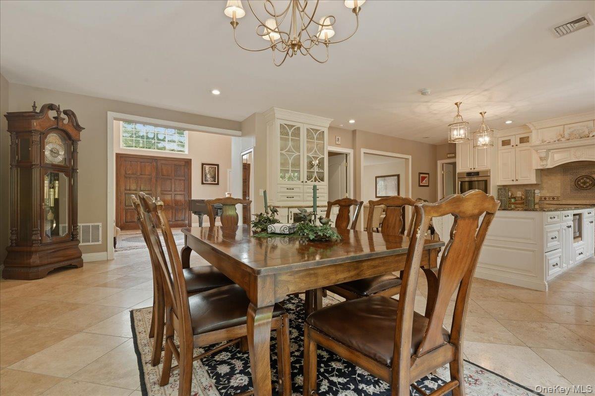 31 Cornwall Lane Sands Point, NY 11050 - Photo 15 of 49 a view of a dining room with furniture