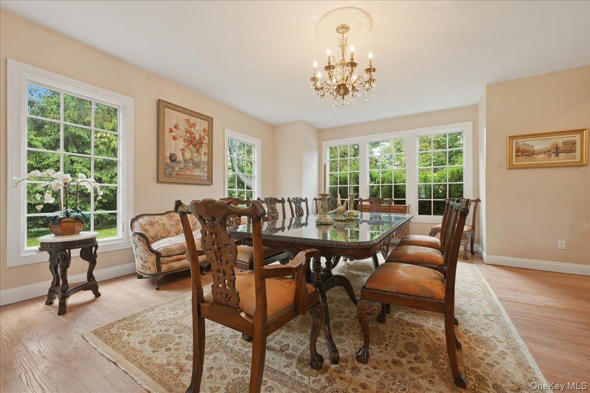 31 Cornwall Lane Sands Point, NY 11050 - Photo 10 of 49 a view of a dining room with furniture window and outside view
