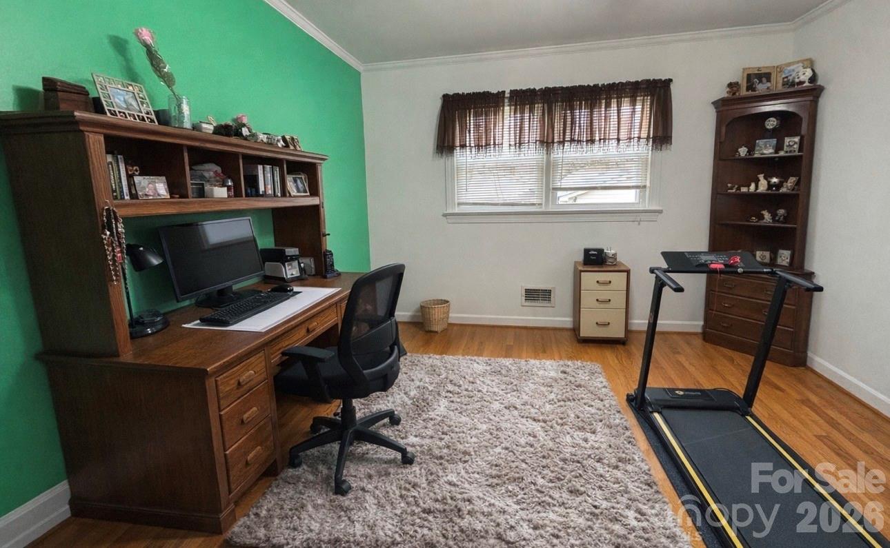 503 9th Avenue Southwest Conover, NC 28613 - Photo 26 of 39 a view of a workspace with furniture and a window